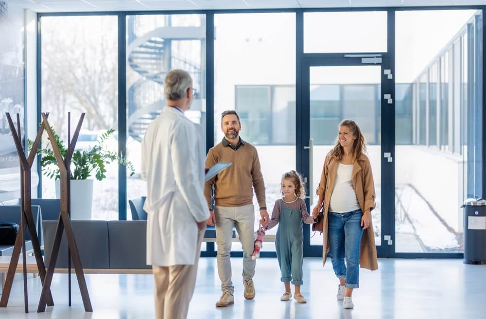 Exterior of an urgent care clinic showing patient entrance and signage