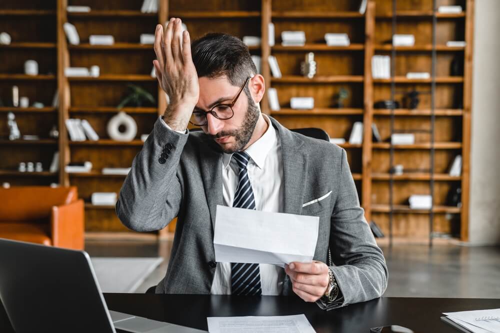 ealthcare billing team analyzing denied insurance claims for appeal and correction